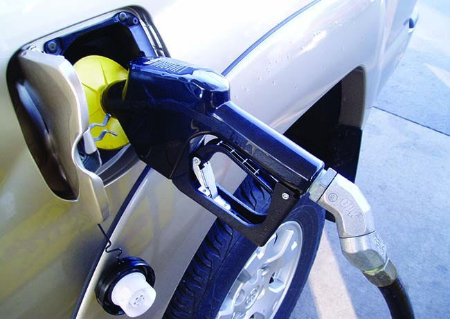 Pumping gasoline into a car