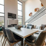 Luxurious living room with fireplace in a Black Rock Mountain Resort condo, Heber City, Utah.