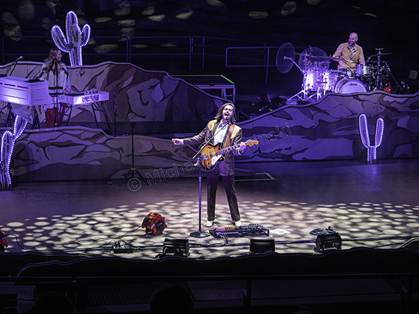 Another shot of Misty Boyce and Brandon Walters performing with Lord Huron at Red Rocks, emphasizing their contributions to the band's sound.