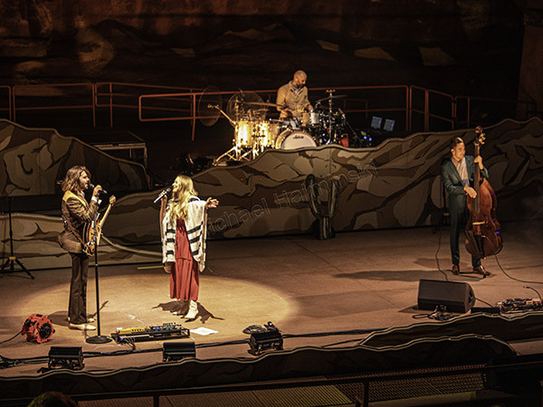 Ben Schneider and Misty Boyce performing a duet of &quot;I Lied&quot; at the Lord Huron Red Rocks concert, a crowd-pleasing moment.
