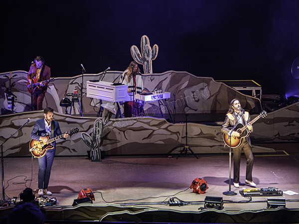 Another shot of Mark Barry drumming with intensity during the Lord Huron Red Rocks concert, highlighting his crucial role in the band's sound.