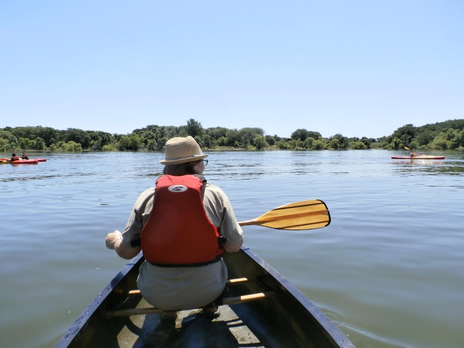 People paddling on Roberts Creek at Red Rock Lake