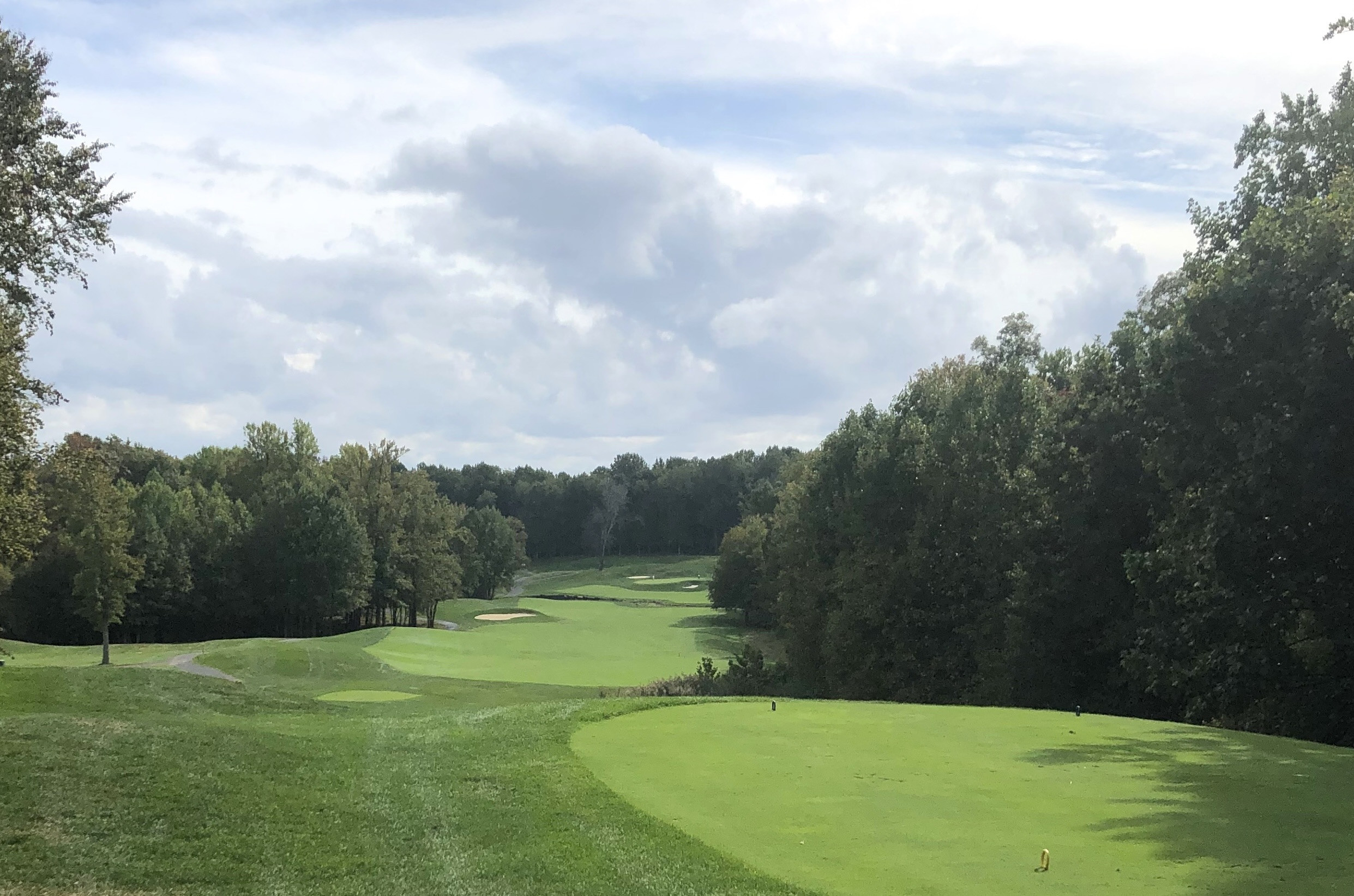 Bulle Rock Golf's par 5 2nd hole, a visually stunning and strategically challenging hole with an elevated tee and creek hazard.