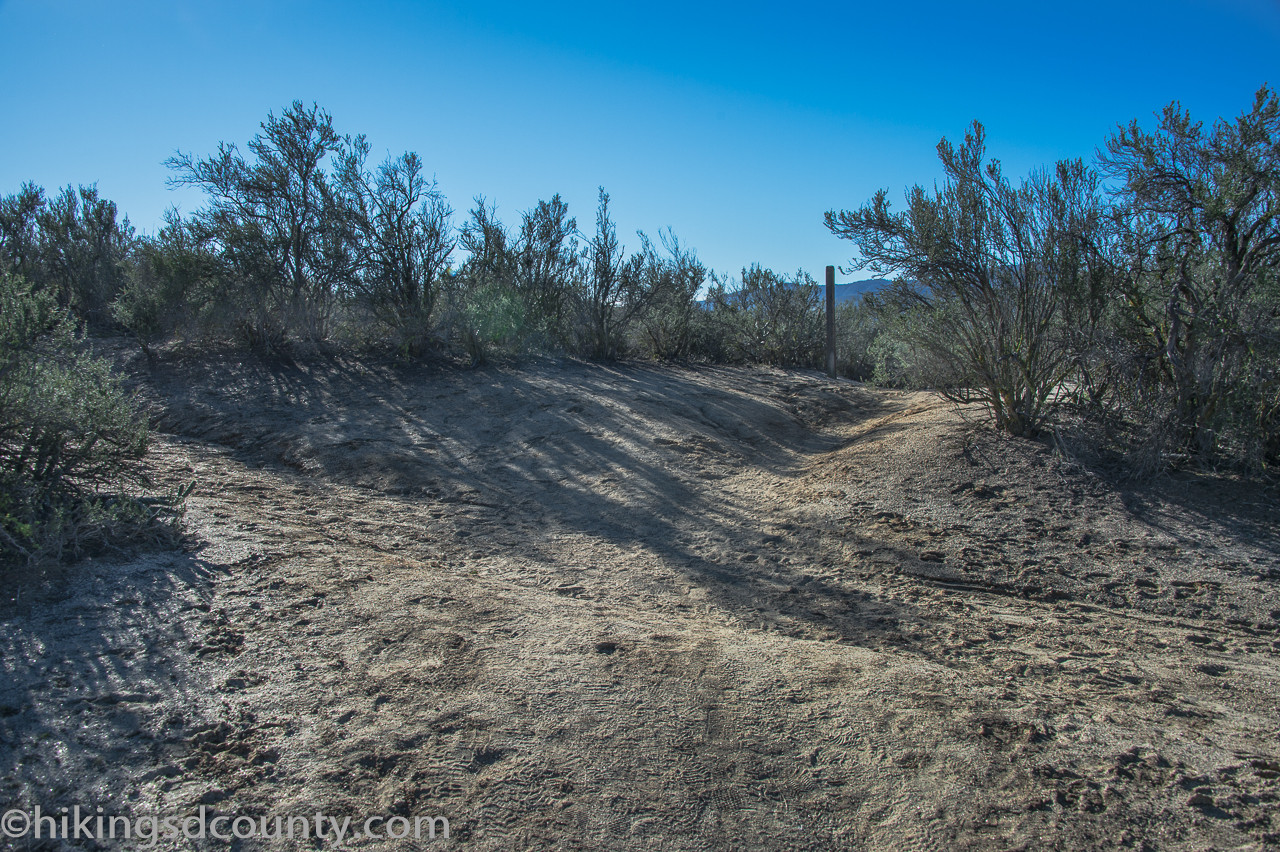 Four-way trail intersection, continue straight for Eagle Rock on PCT