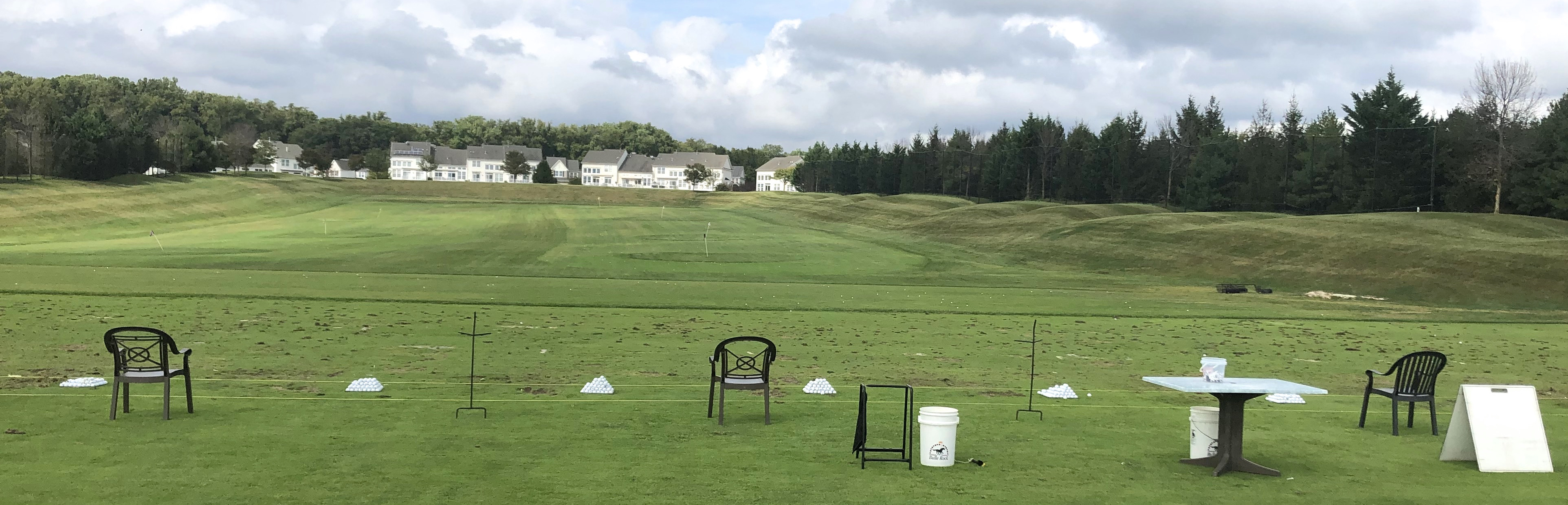 Bulle Rock Golf's driving range, superior to many private courses, offering excellent practice facilities.