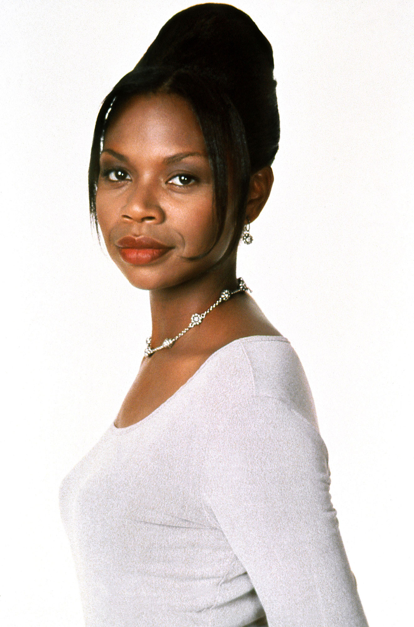 Simbi Khali as Nina Campbell in 3rd Rock From the Sun