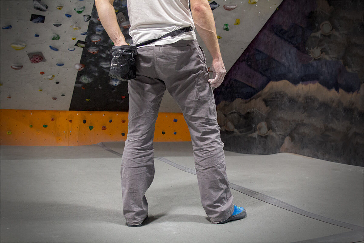 3rd Rock Ramblas pants in a climbing gym environment, showing chalk dust accumulation after use.