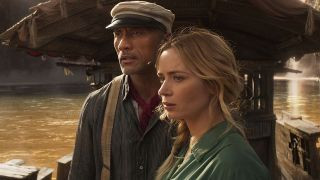 Dwayne Johnson and Emily Blunt on a boat in Jungle Cruise movie