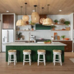 Open concept kitchen and dining area with green accents.