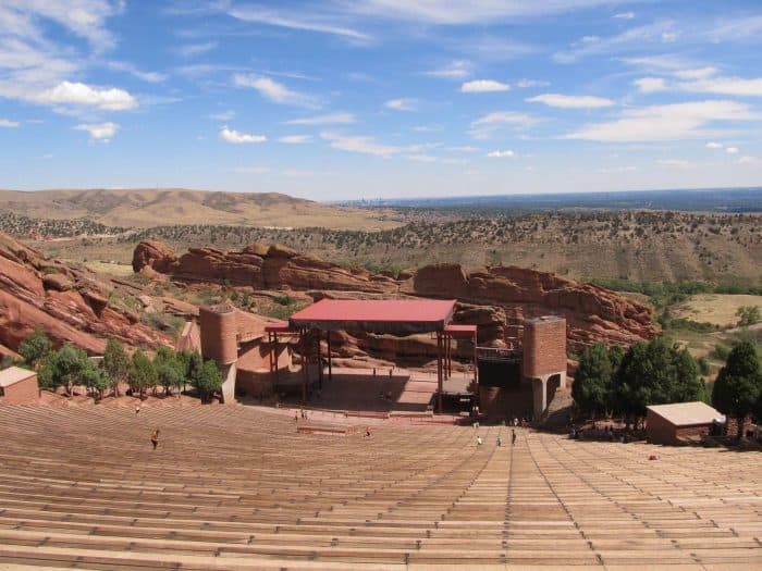 Fans walking up the stairs inside Red Rocks Amphitheatre to find their seats