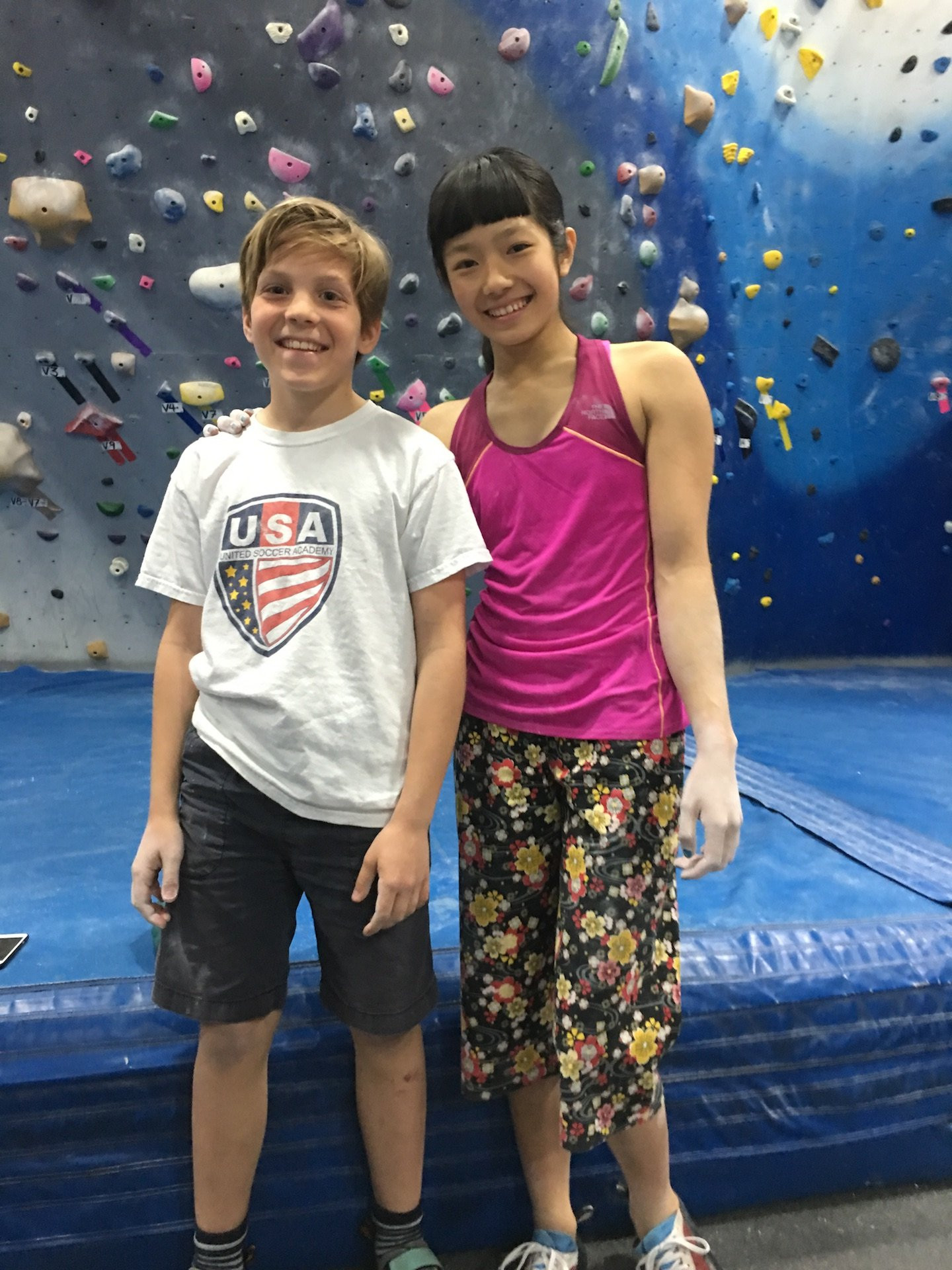 Various climbing walls at The Cliffs, a popular indoor rock climbing destination in NYC.