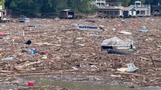 Aerial view of Chimney Rock, North Carolina, showcasing the extensive flooding and devastation from Hurricane Helene.