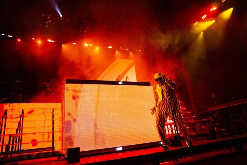 Colorful stage lighting during a concert at Red Rocks Amphitheatre, demonstrating the vibrant and dynamic atmosphere of live music performances.