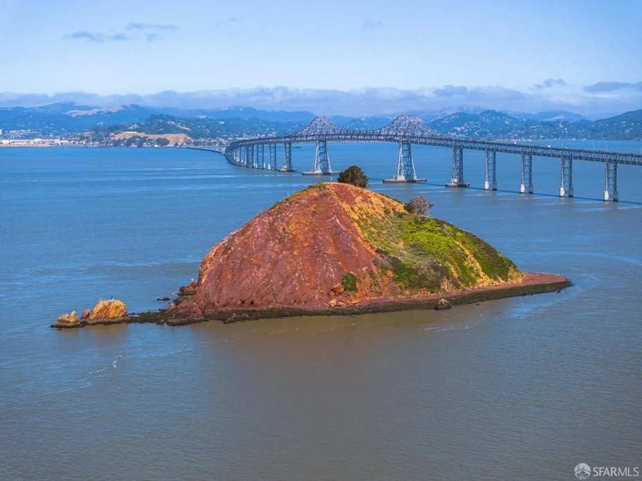 Aerial view of Red Rock Island showcasing its unique geological formations and strategic location in San Francisco Bay