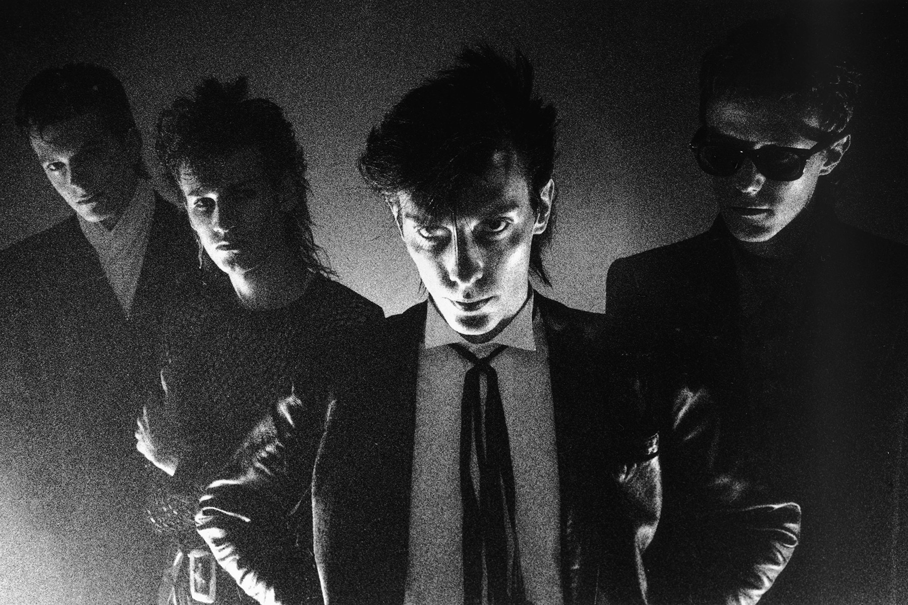 UNITED KINGDOM - AUGUST 01: Photo of Peter MURPHY and BAUHAUS and David J and Kevin HASKINS and Daniel ASH; Posed group portrait L-R Kevin Haskins, Daniel Ash, Peter Murphy, David J, (Photo by Fin Costello/Redferns)