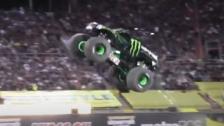 Monster truck jumping during a Monster Jam event