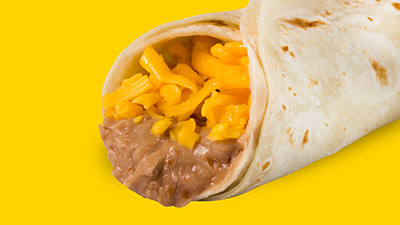 Simple and delicious bean and cheese breakfast taco at Taco Palenque Round Rock, showcasing refried beans and melted cheese.