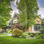 Flagstone patio with lush greenery