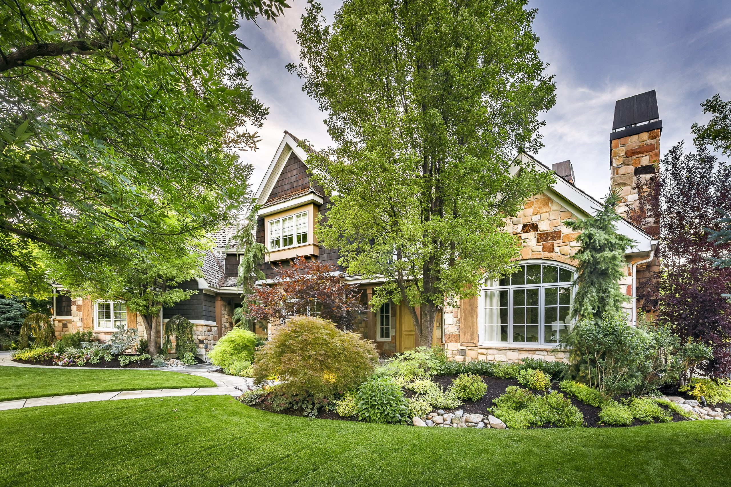 Flagstone patio with lush greenery