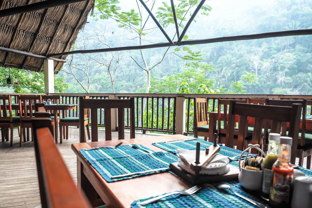 Open-air dining area in the jungle at Black Rock Lodge Belize