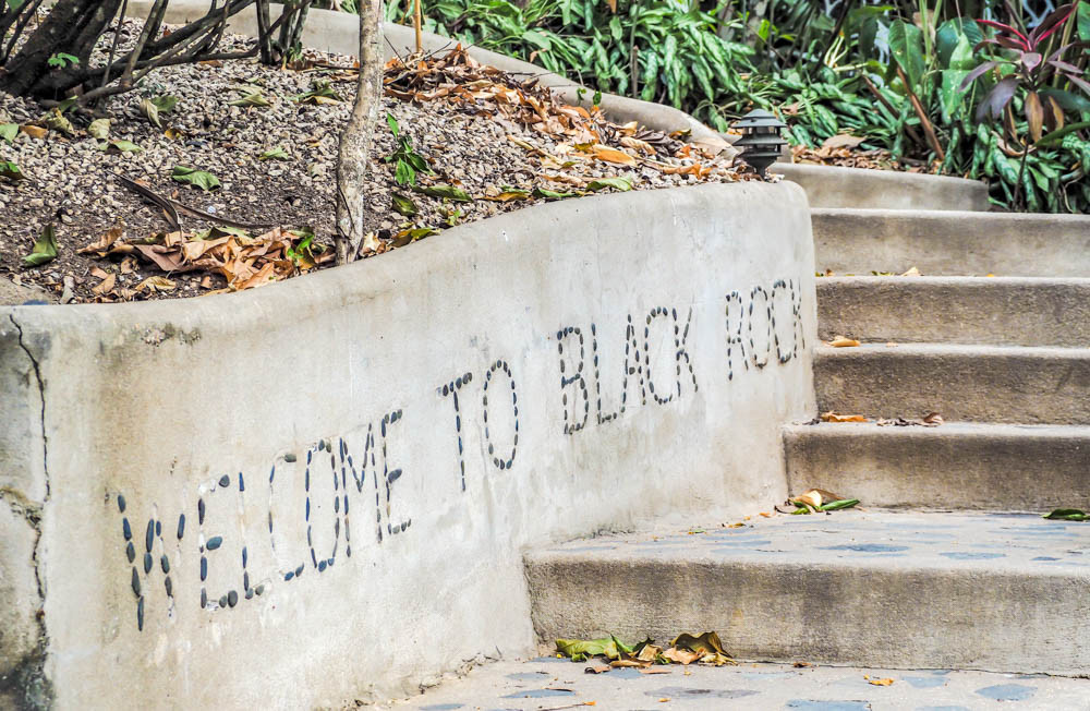 Welcome sign made of rocks at Black Rock Lodge Belize