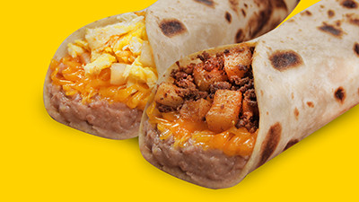 Breakfast piratas plate at Taco Palenque Round Rock, offering a choice of potato and egg or potato and chorizo tacos with beans and cheese.