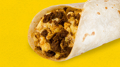 Delicious Mexican chorizo and egg breakfast taco from Taco Palenque Round Rock, showcasing a flavorful blend of spices and scrambled eggs.