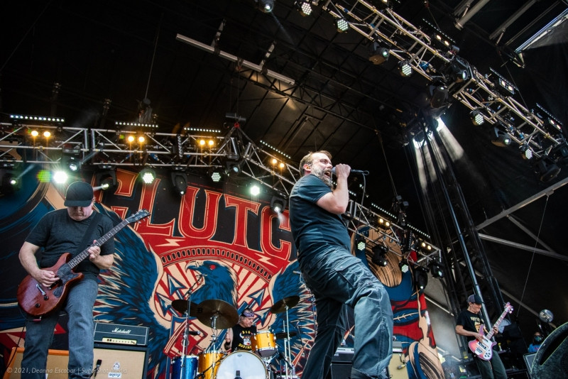 Clutch performing on stage at Blue Ridge Rock Festival Day 2. A wide shot capturing the band Clutch performing their set on stage.