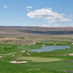 Jagged edge bunker at Copper Rock Golf Course highlighting the contrast with the desert landscape