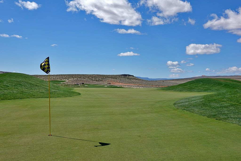 Back view of the 5th (Sidewinder) Hole green at Copper Rock Golf Course, emphasizing the slope and undulations