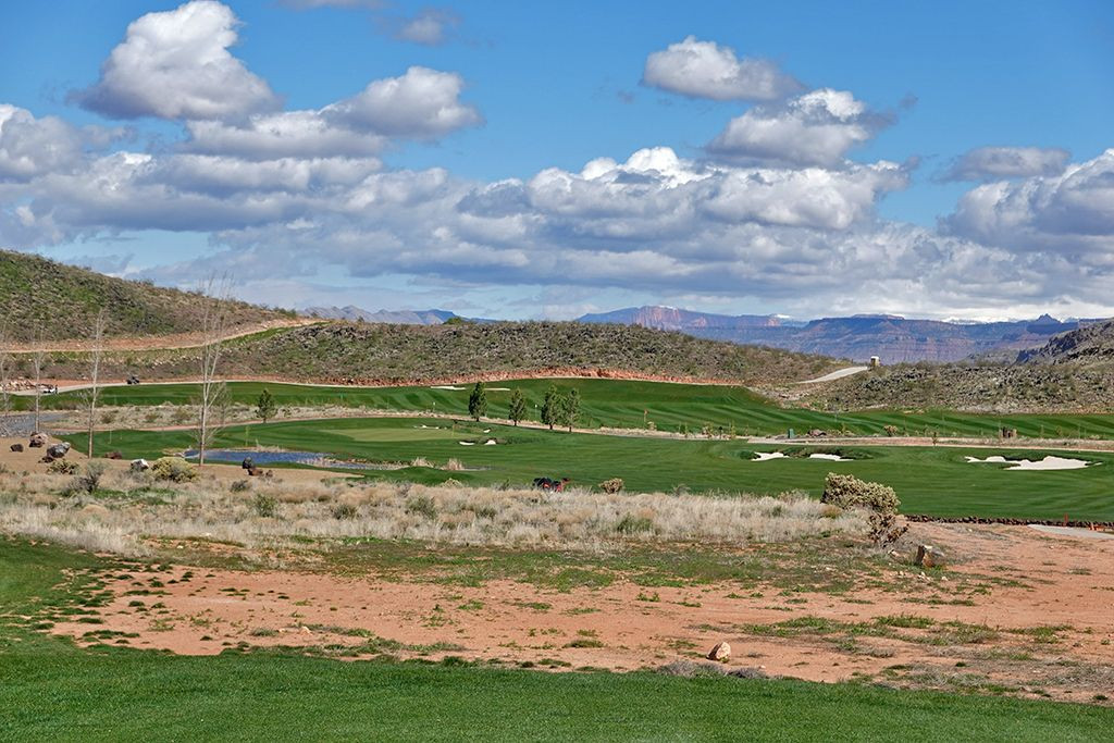 Overview of the 6th (Shipwreck) Hole at Copper Rock Golf Course, highlighting the water hazard and fairway