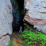 A narrow crevice along the Bluff Trail, showcasing the natural rock formations and hiking path within Lookout Mountain.