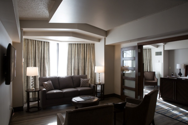 Cherokee Suite Living Room with Hardwood Floors at Tulsa Hard Rock Hotel