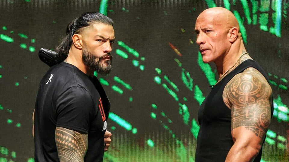 Wrestling cousins The Rock and Roman Reigns stand together in a show of force.