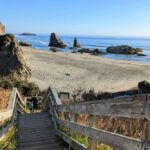 Navigating the sandy trails and stairs to Face Rock beach