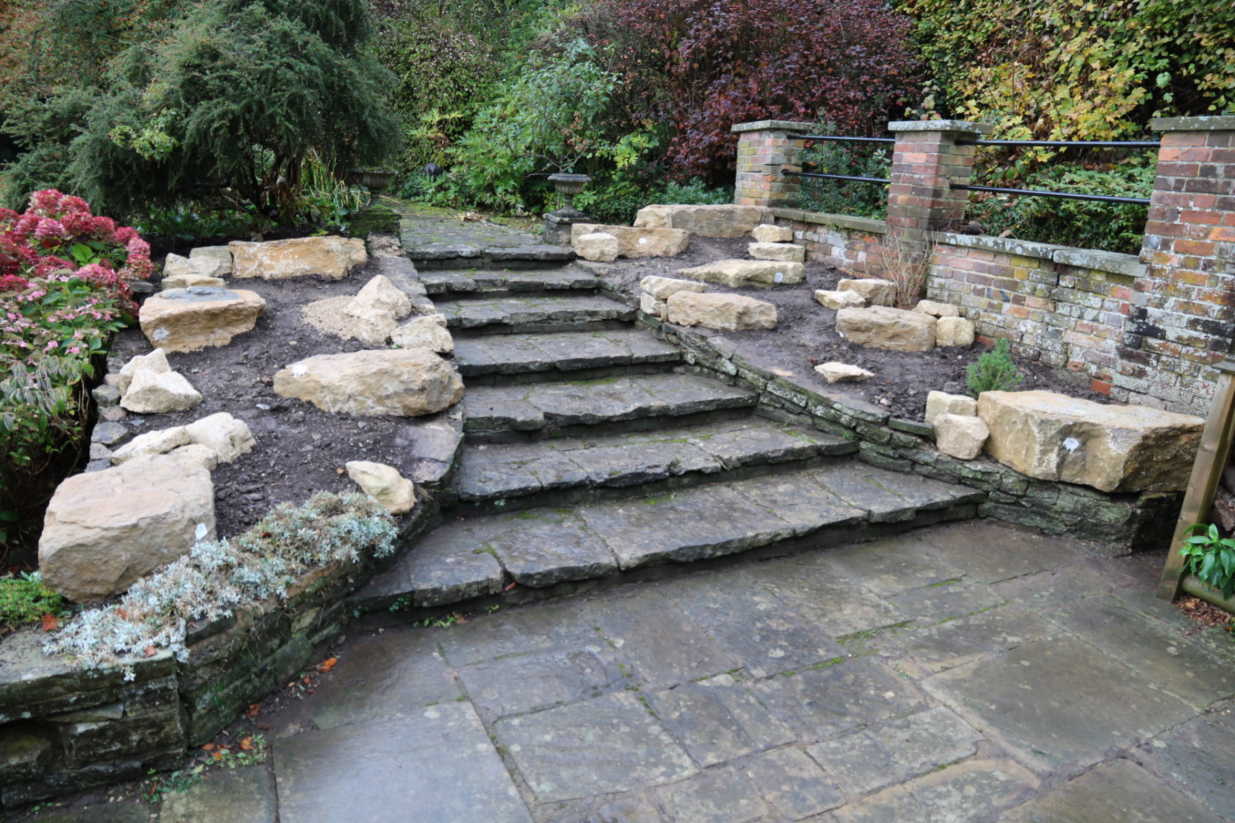 Final rock garden design with keystone and smaller rocks