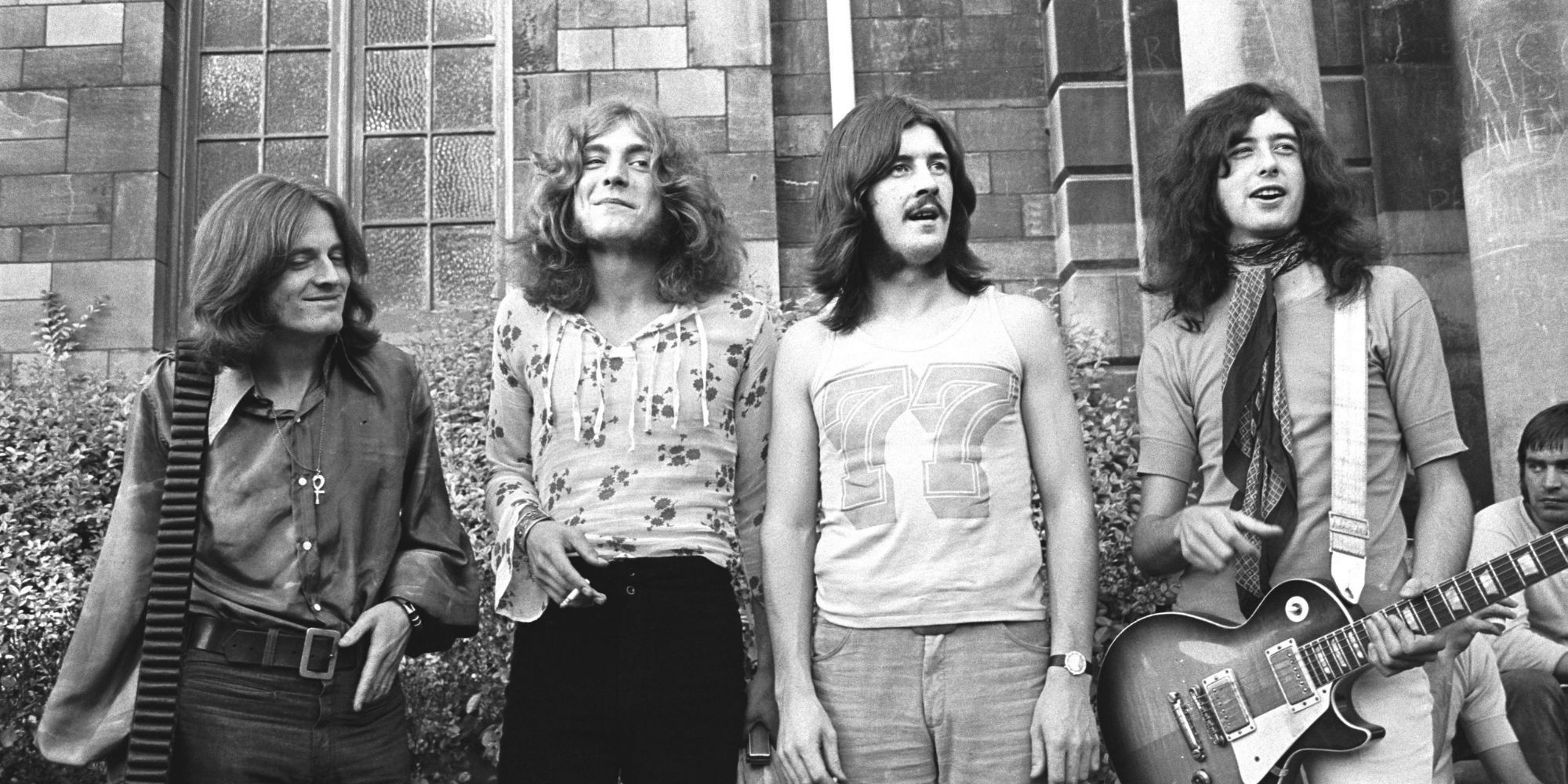 Led Zeppelin live in concert, showcasing their legendary stage presence and musical prowess that cemented their status as one of the greatest rock bands of all time.