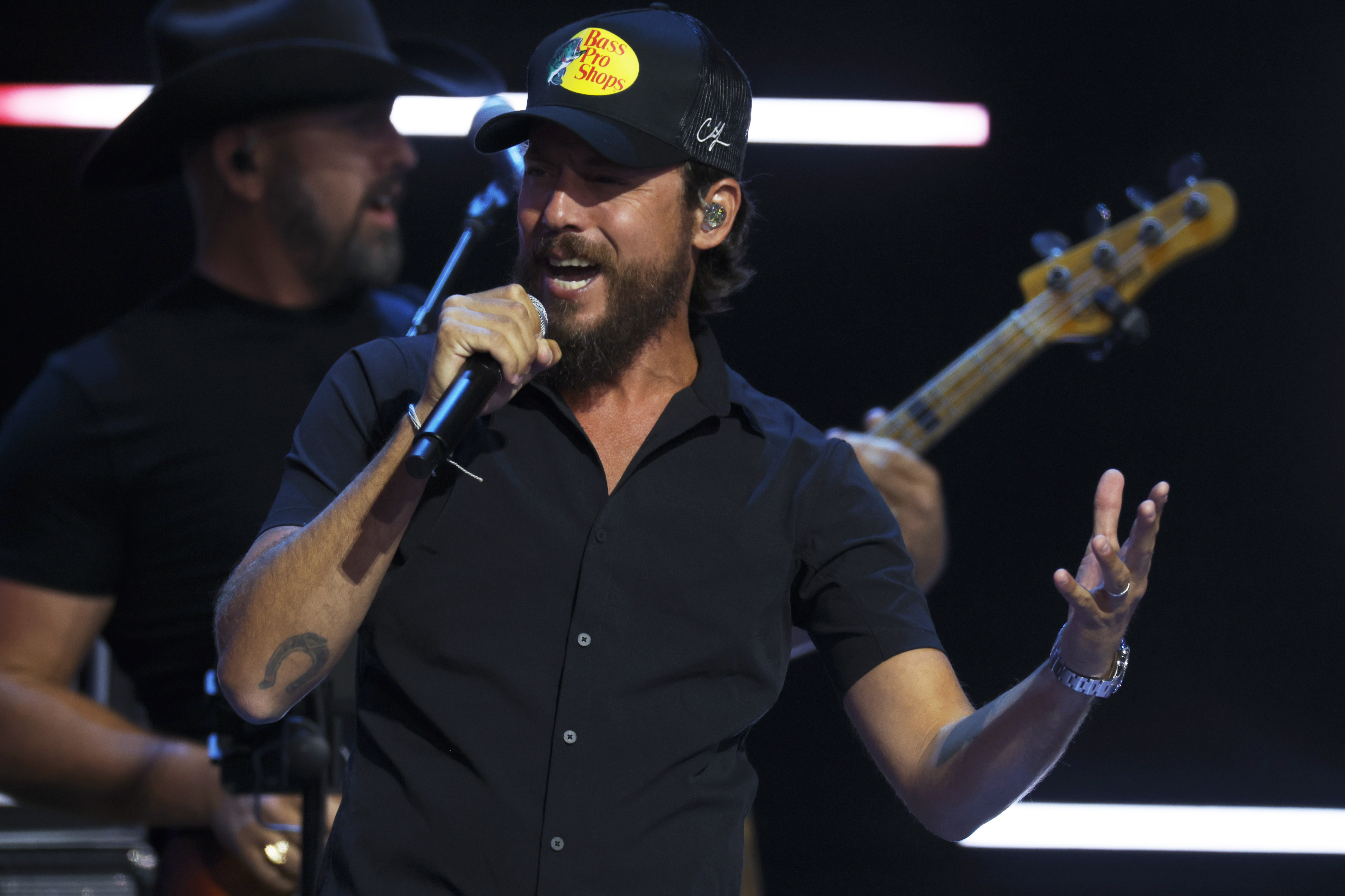 Chris Janson performing on stage