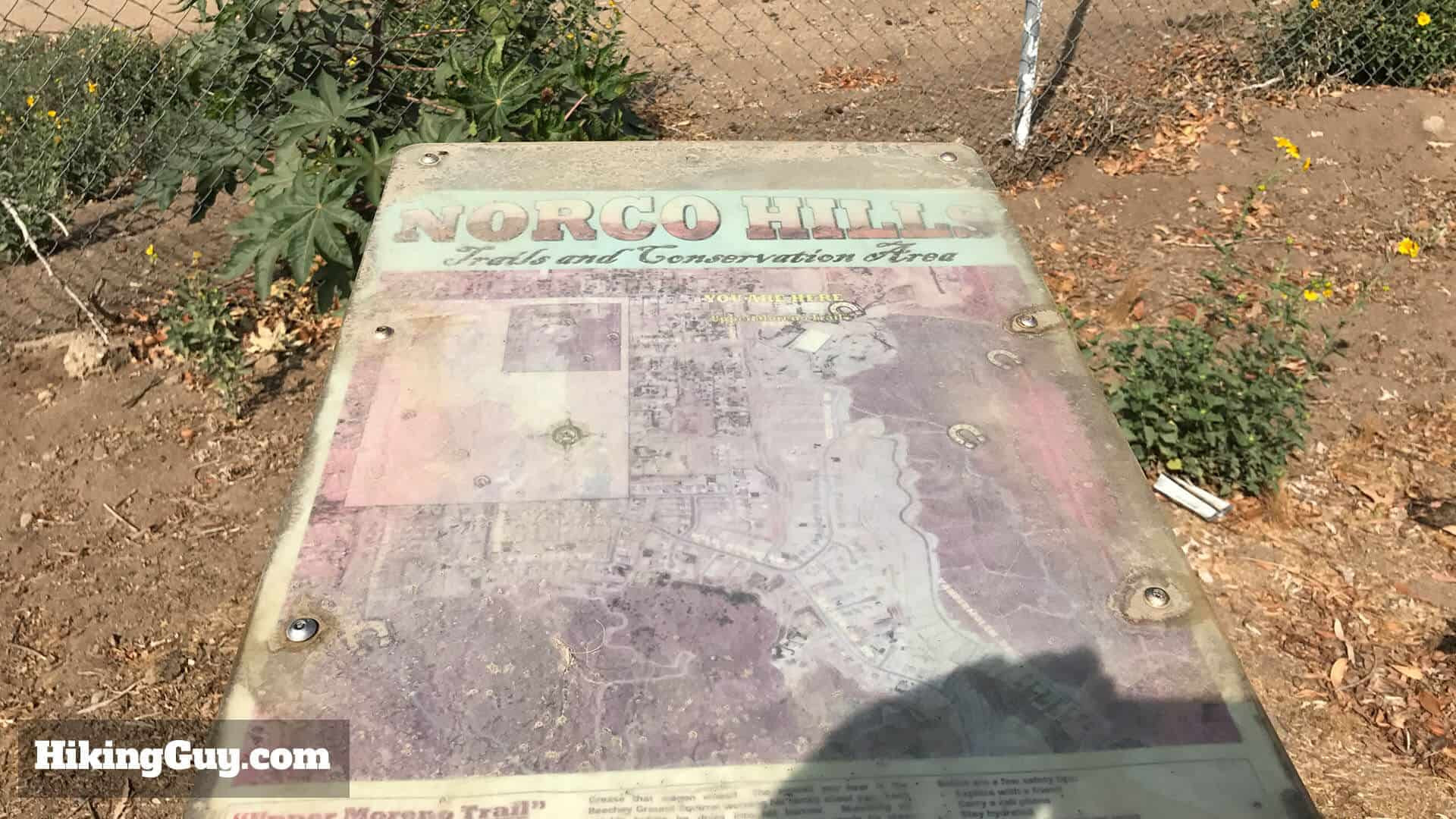 Norco Hills Trail Sign for Pumpkin Rock: A weathered Norco Hills sign marks the trail, though cell reception aids navigation for most hikers.