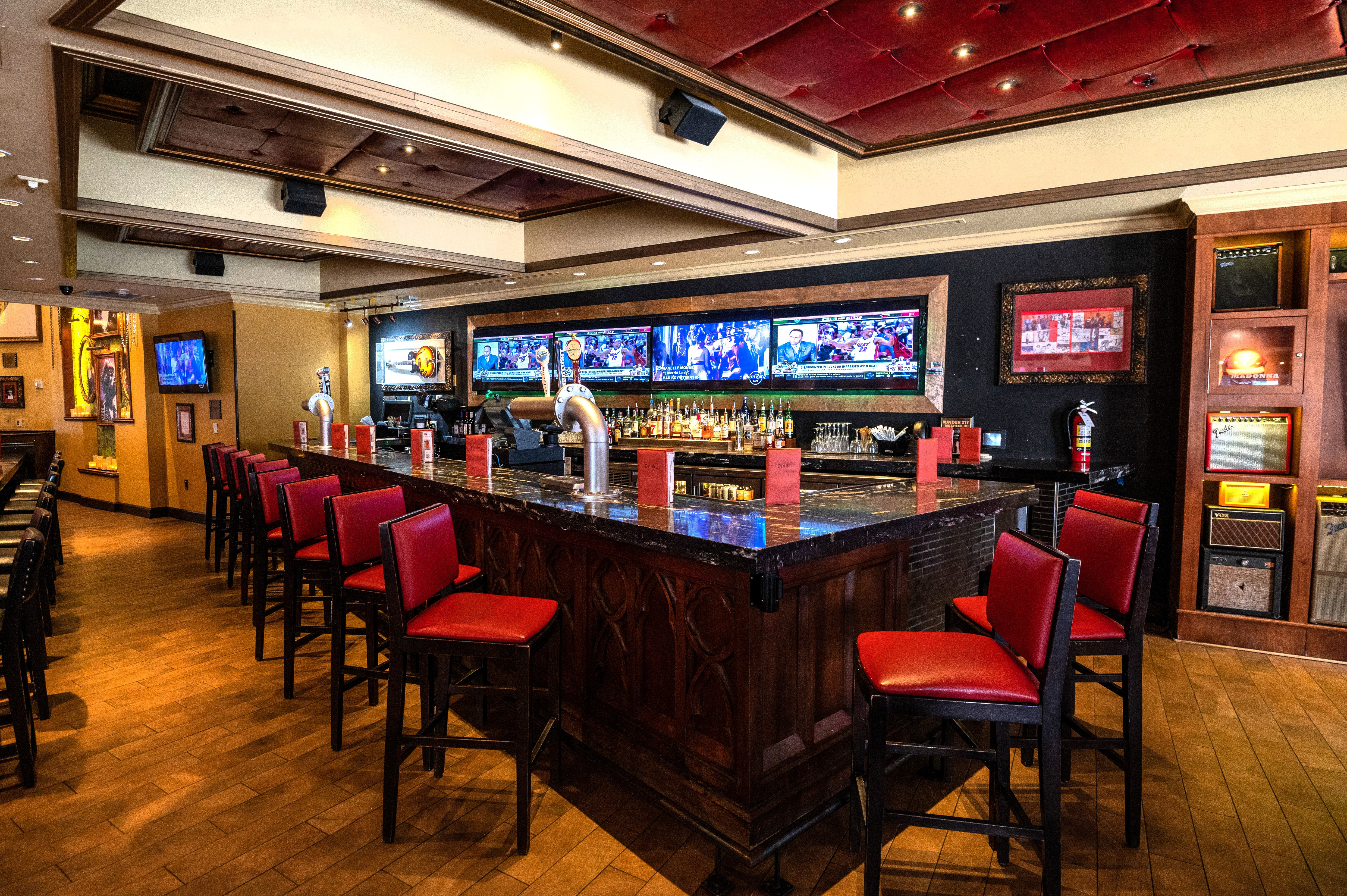 alt text: The bar at Hard Rock Cafe Philadelphia, a popular spot for happy hour.