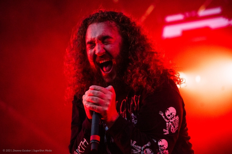 Eric Vanlerberghe of I Prevail performing at Blue Ridge Rock Festival Day 2. The I Prevail vocalist is singing intensely during their performance.