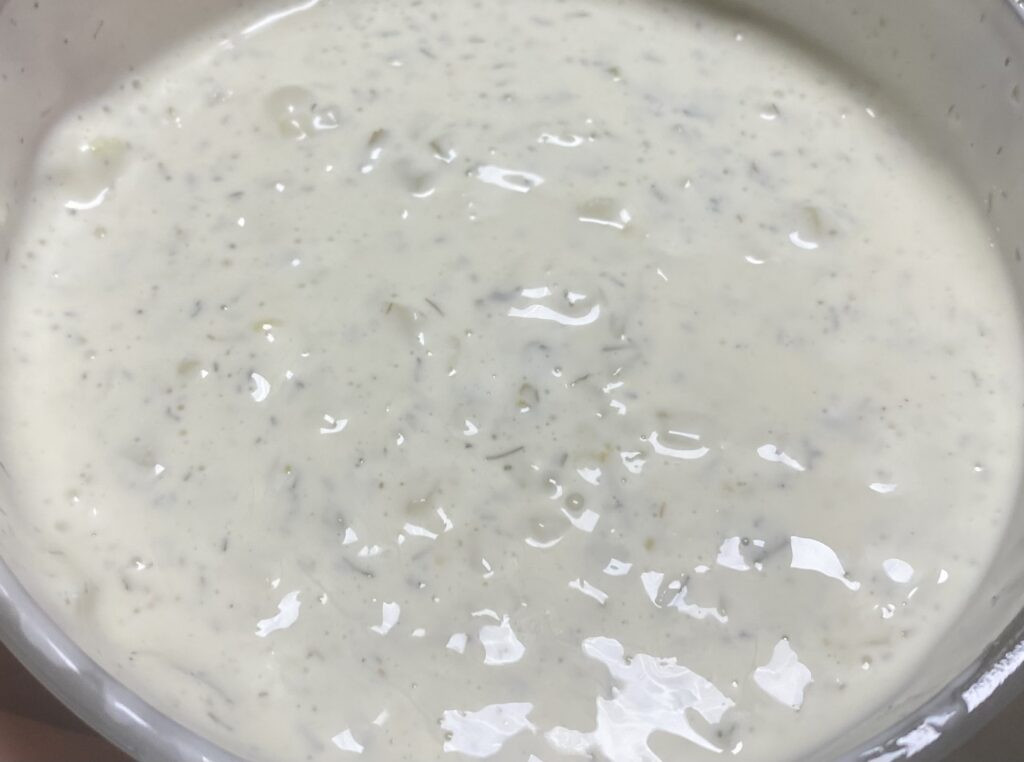 Bowl of creamy homemade tartar sauce, the ideal accompaniment to fried rock fish.