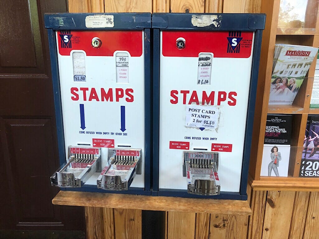 Nostalgic stamp machines offering vintage Rock City keepsakes for visitors