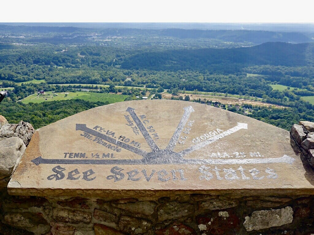 The iconic &quot;See Seven States&quot; sign at Rock City, inviting visitors to admire the expansive view