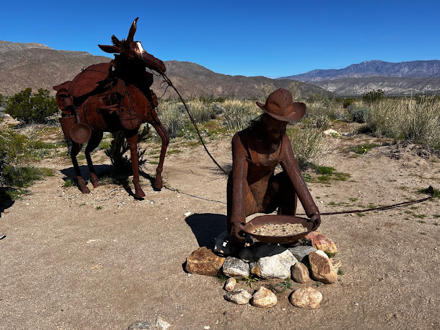 Desert Metal Sculpture of a Gold Miner