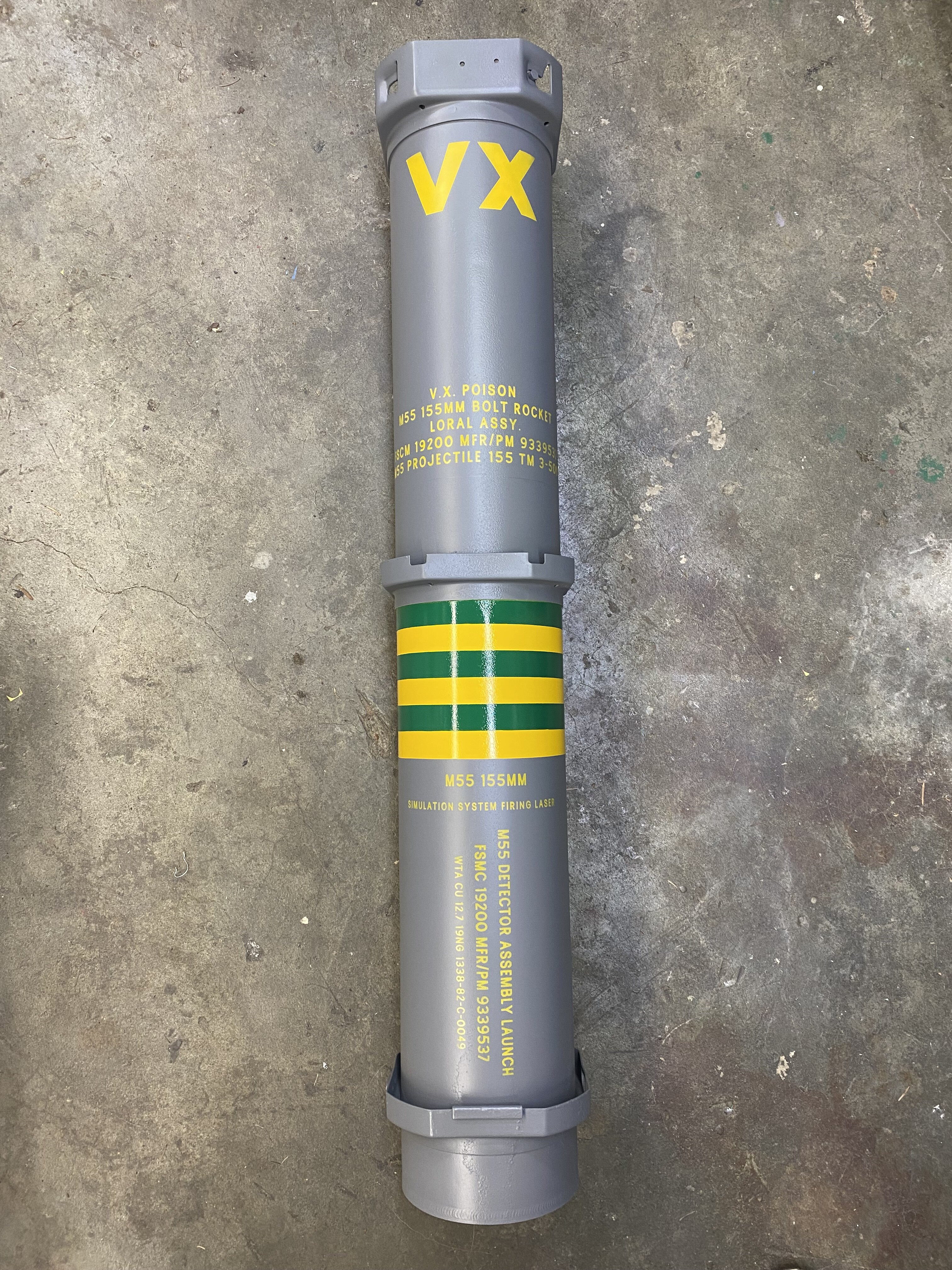 VX canister prop stored inside repurposed and painted tank shell case