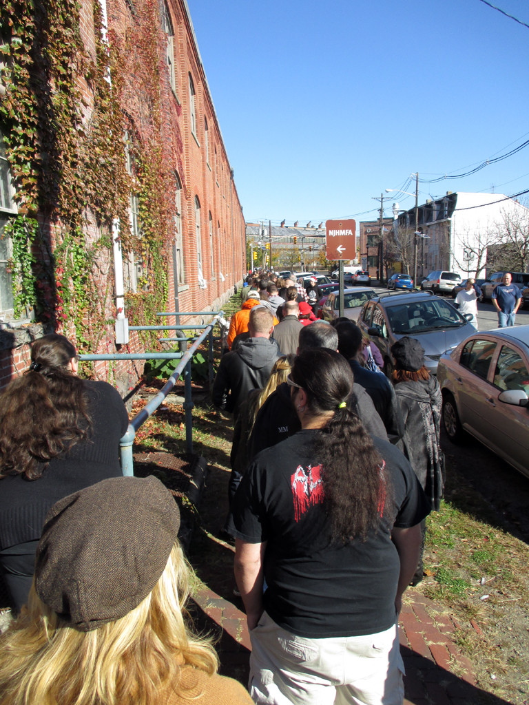 The entrance line for the Trenton Punk Rock Flea Market wrapping around the Roebling Wire Works building.