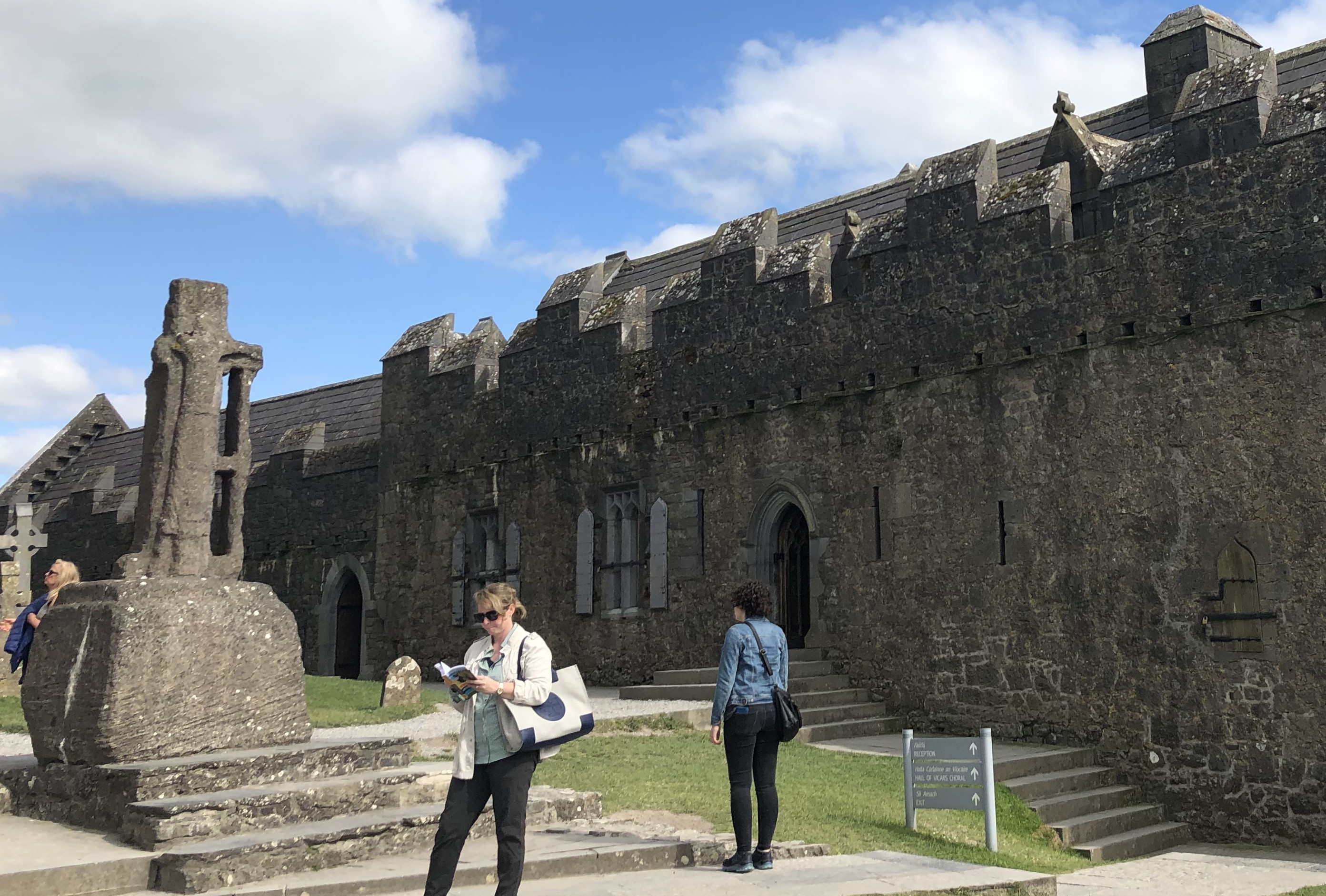 Replica of St. Patrick's Cross standing outdoors at the Rock of Cashel