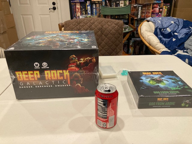 Deep Rock Galactic Board Game Box with Coke Can for Scale -  Visualizing the Impressive Size of the Deep Rock Galactic Box