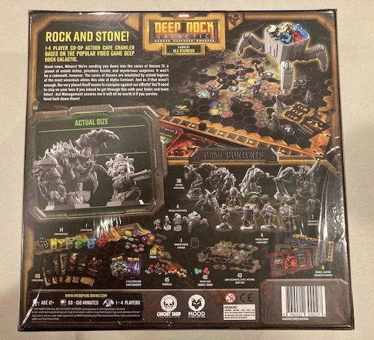 Deep Rock Galactic Board Game Components Laid Out -  Rulebooks, Punchboards and Dwarf Player Boards Ready for Exploration